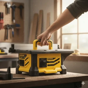 Lightweight 10 inch benchtop table saw being carried by a jobsite handle.